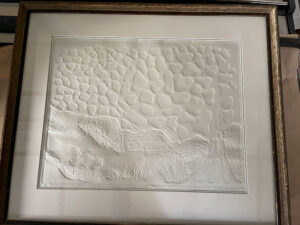Archival framing for displaying and preserving art, Embossed Paper